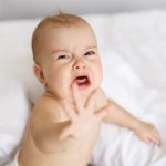 cute-nice-little-baby-woman-crying-lying-with-her-mom-bed-home_176420-14334 (2)