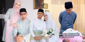 Sufian Suhaimi timang anak perempuan